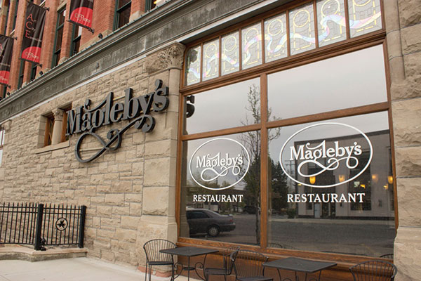 Maglebys windows with signs